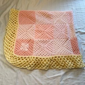 Hand crocheted baby blanket pink and yellow border